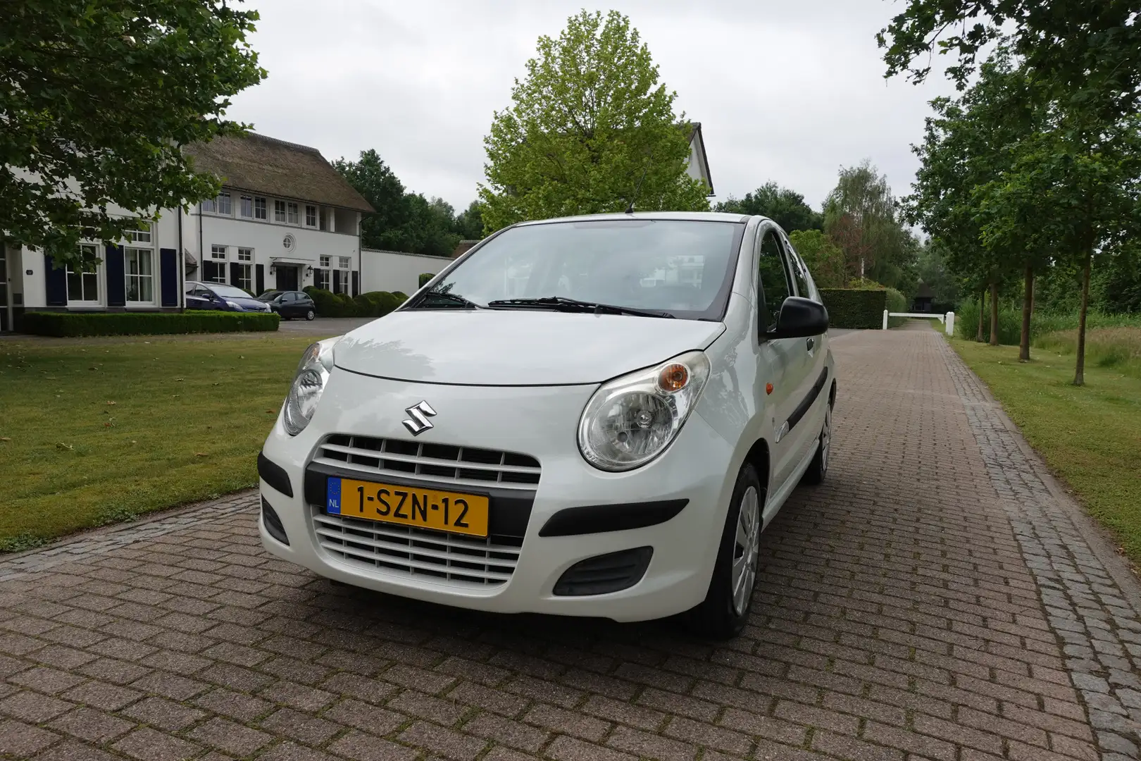 Suzuki Alto 1.0 Comfort EASSS | Trekhaak | Airco | LAGE KM | D Weiß - 2