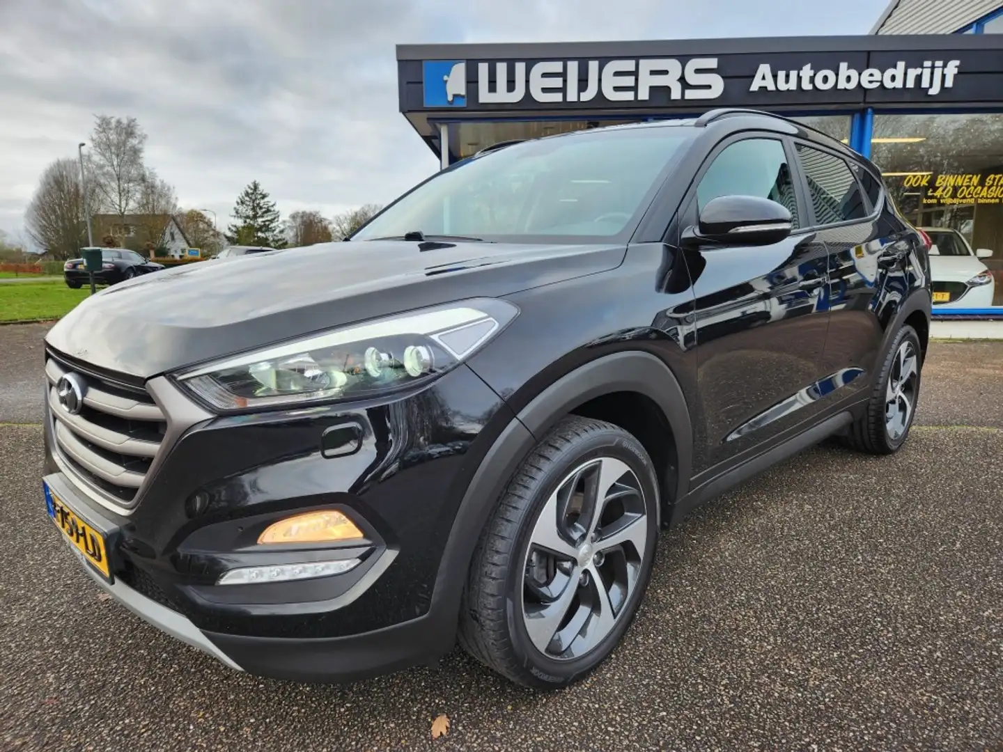 Hyundai TUCSON 1.6 T-GDI 177pk Comfort, Panoramadak, Trekhaak, Na Noir - 1