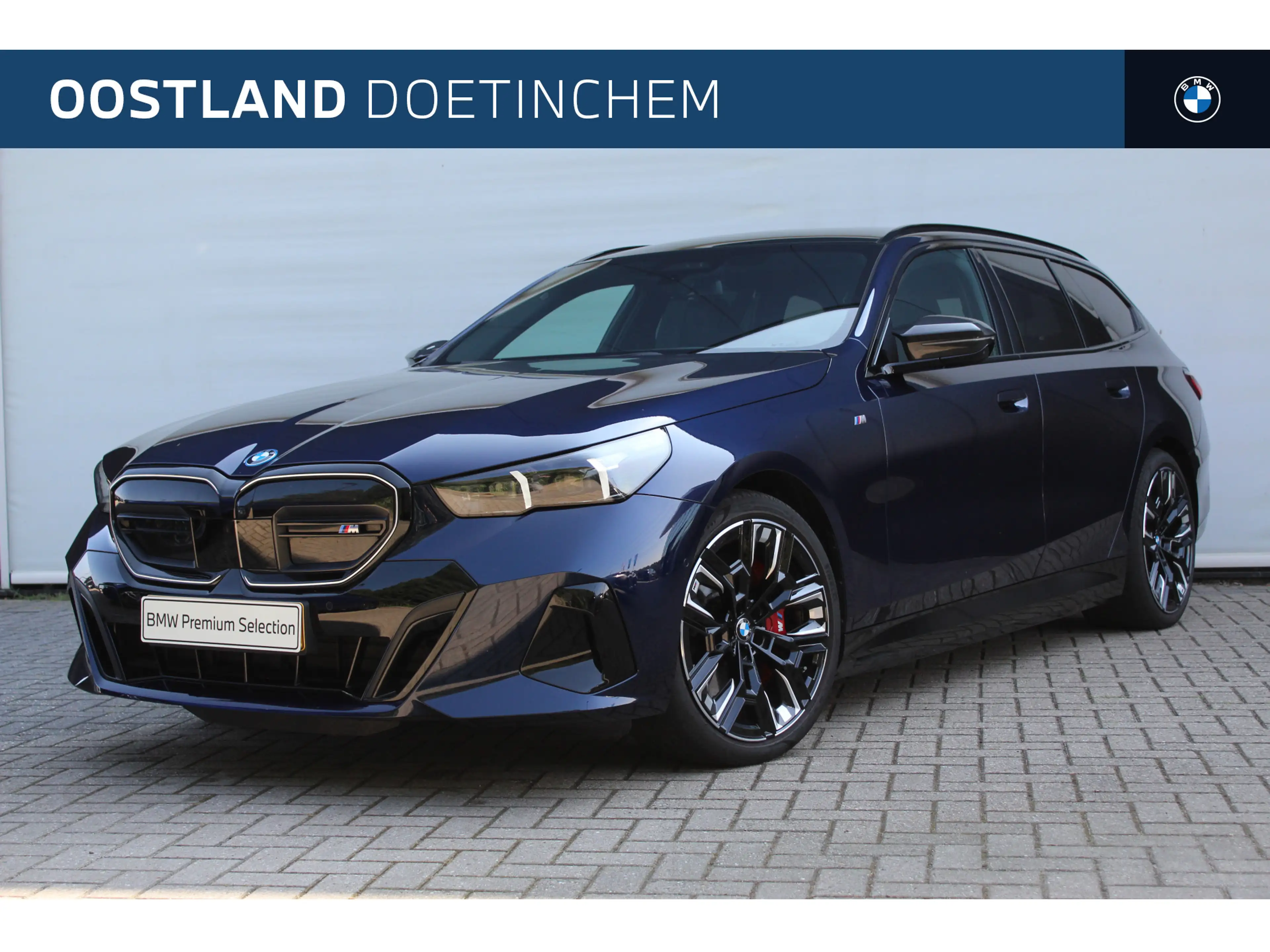 BMW i5 Touring M60 xDrive / Trekhaak / Panoramadak / Bowe