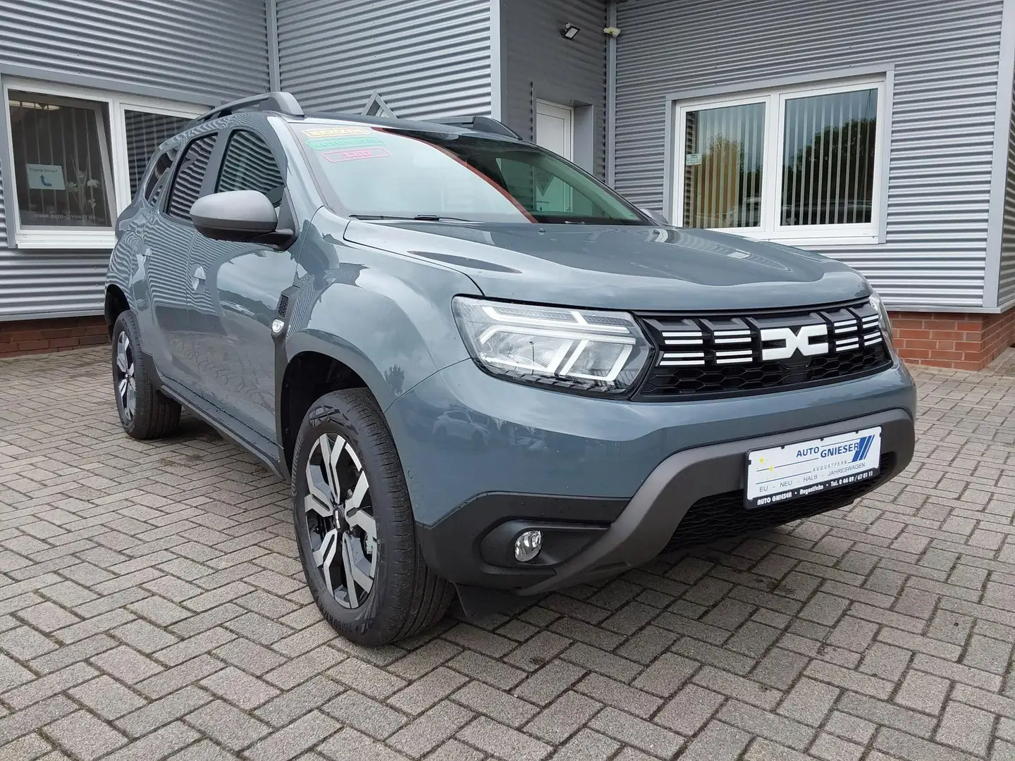 Dacia Duster TCe 150 4x2 Journey APP/LED/PDC/NAV/KAM 110 kW ... Grigio - 1