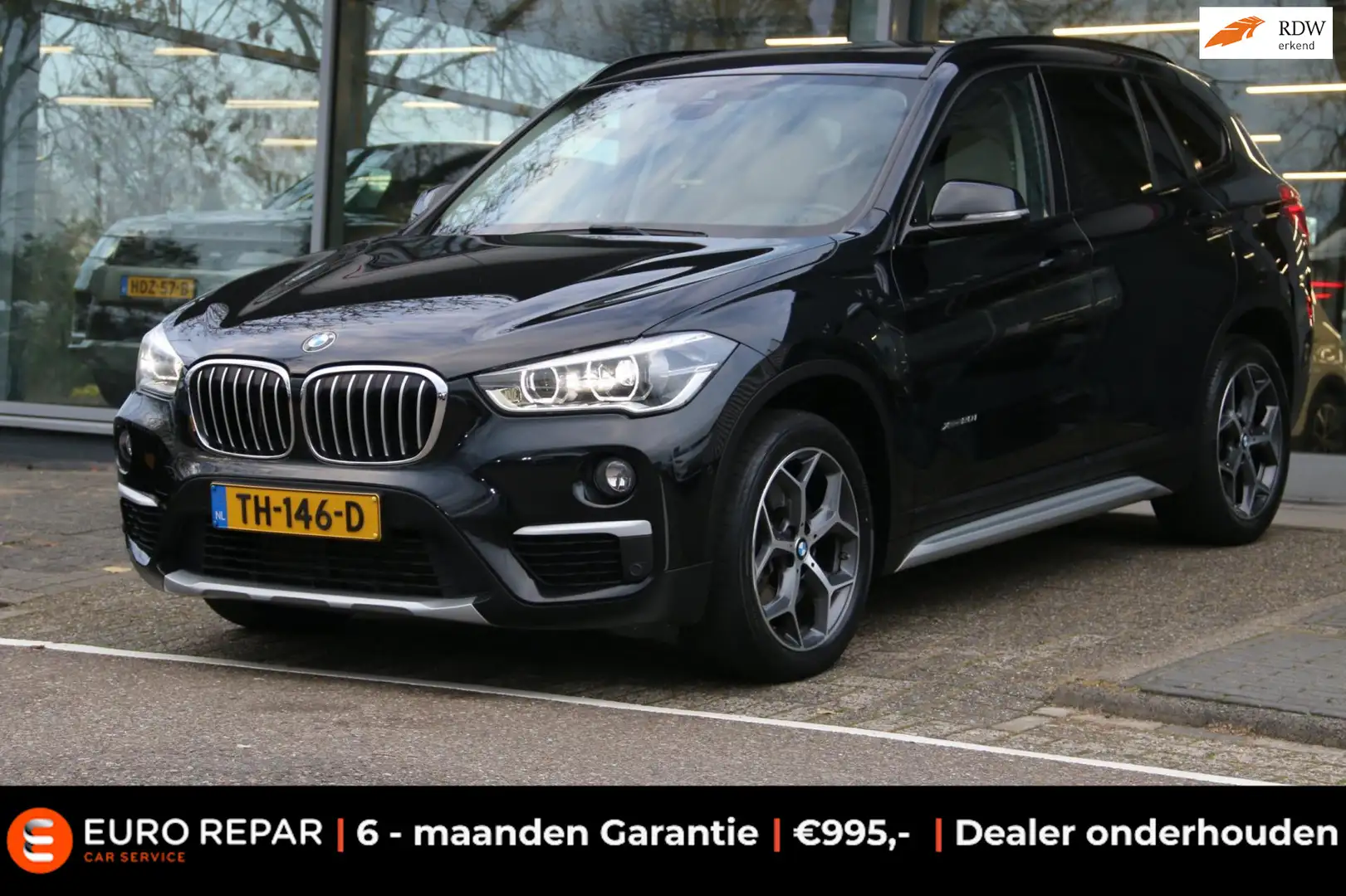 BMW X1 XDrive20i High Executive Zwart - 1