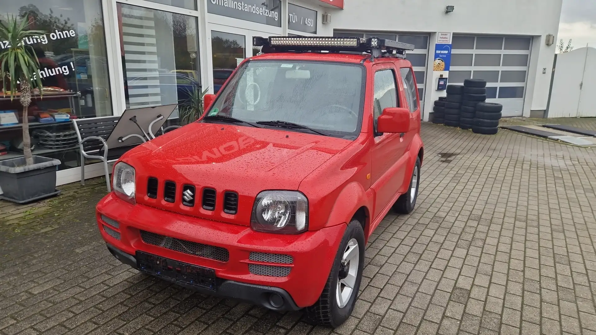 Suzuki Jimny Jimny Club -- Automatik+Klima+Allrad+el.FH+Alu - Rot - 2