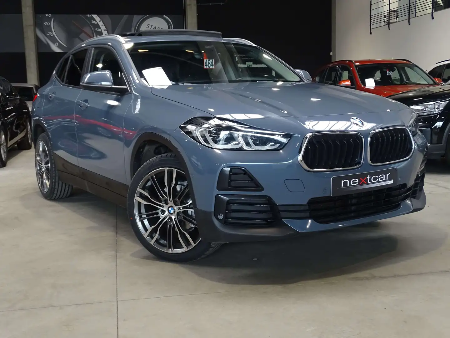 BMW X2 16d SDrive *T PANO-FULL LED-CUIR-NAVI* Grijs - 2