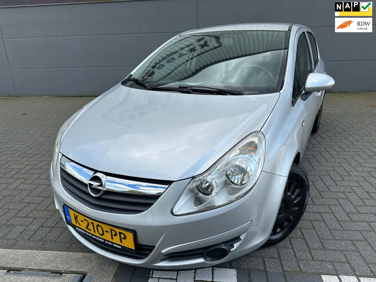 Opel Corsa 1.2-16V Selection*NAVI*APK*NAP*AIRCO*PARK-SENSOREN Grijs - 1