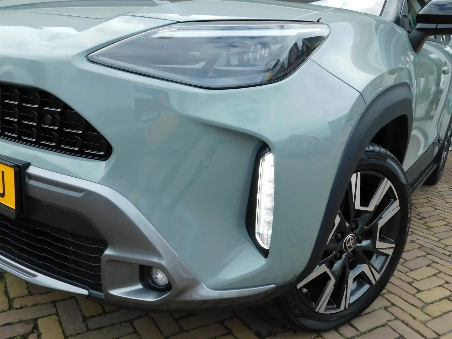 Toyota Yaris Cross 1.5 Hybrid 130 Launch Edition | Treeplanken Groen - 2