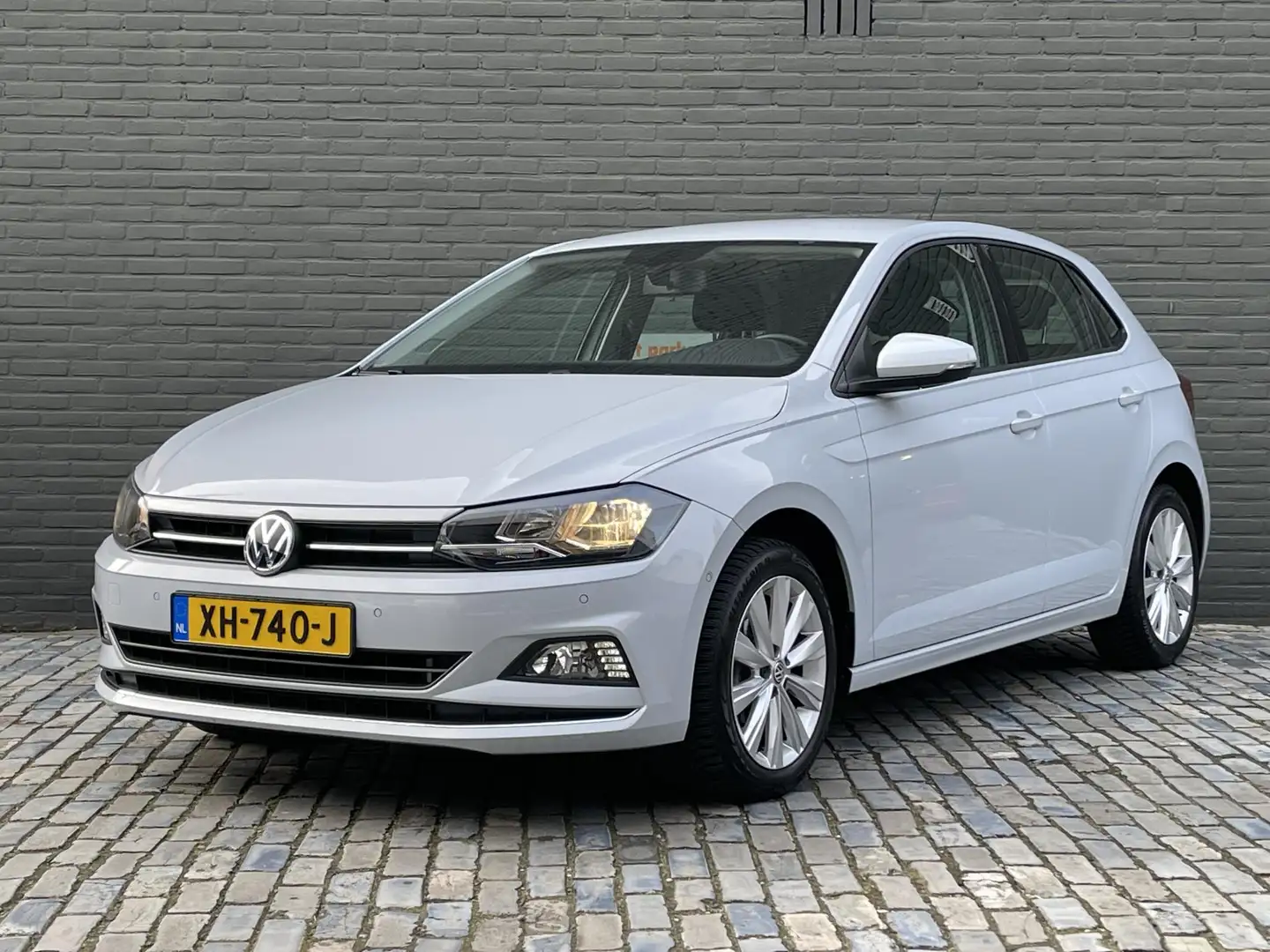 Volkswagen Polo 1.0 TSI HIGHLINE I NAVIGATIE I APPLE/ANDROID AUTO Wit - 1