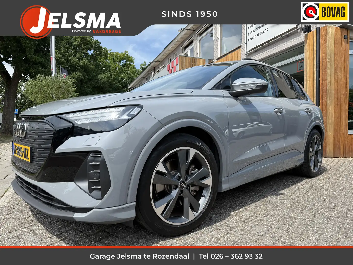 Audi Q4 e-tron 40 Launch edition Advanced 77 kWh, Navi & CarPlay Grijs - 1