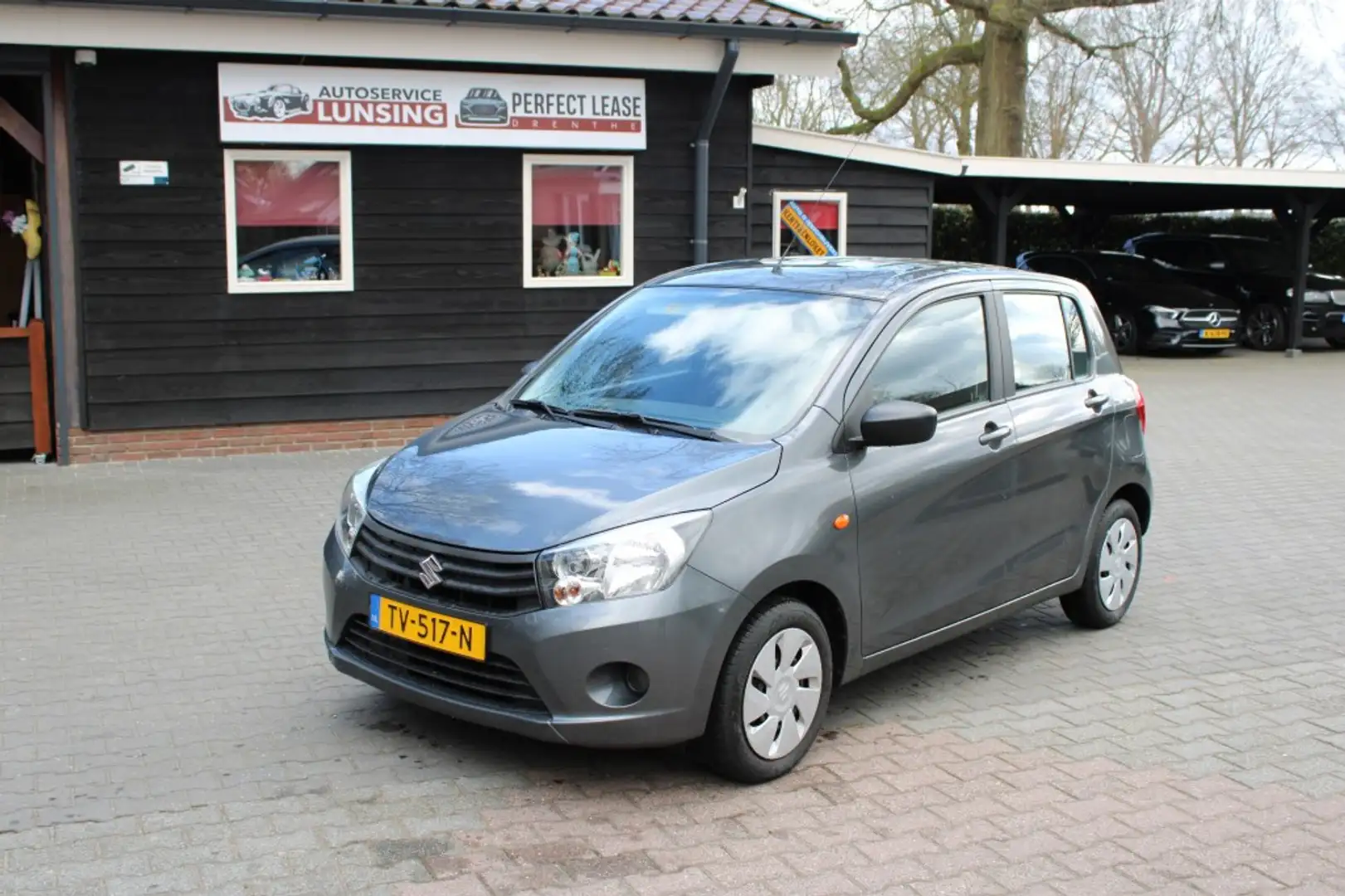Suzuki Celerio 1.0 Comfortr 5drs - Airco Bluetooth audio elek pak Grijs - 1