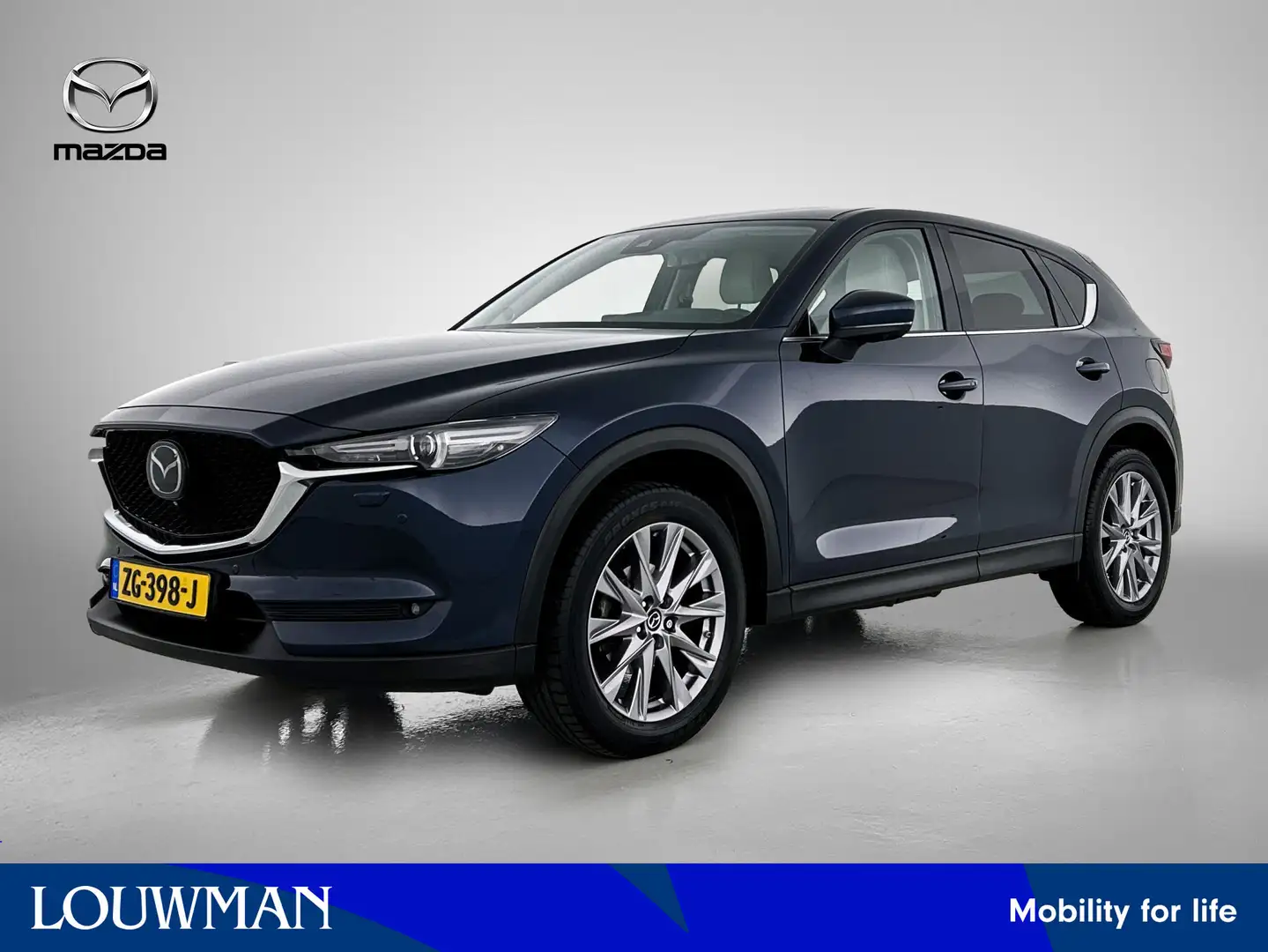 Mazda CX-5 2.0 SkyActiv-G 165 Luxury | Navigatie | Leder | Ca Blauw - 1