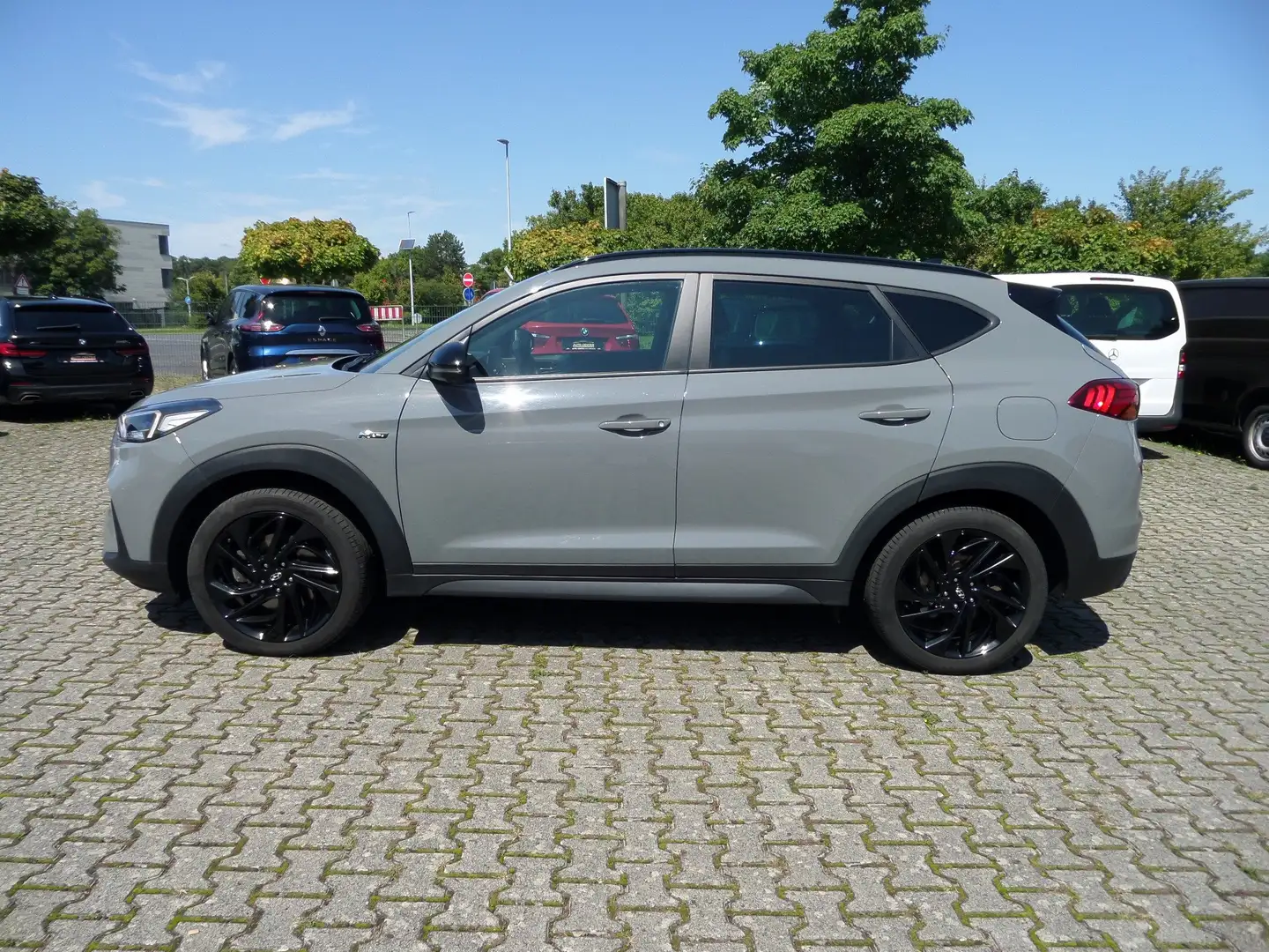 Hyundai TUCSON N Line Mild-Hybrid 4WD+Auto+LED+ACC+Navi+AHK+Leder Grau - 1