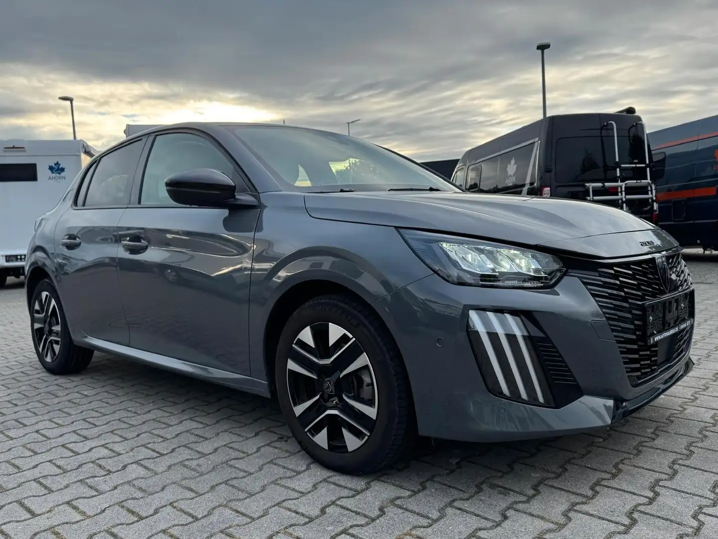 Peugeot 208 1.2 Pure Tech 100 | KAMREA Grijs - 1