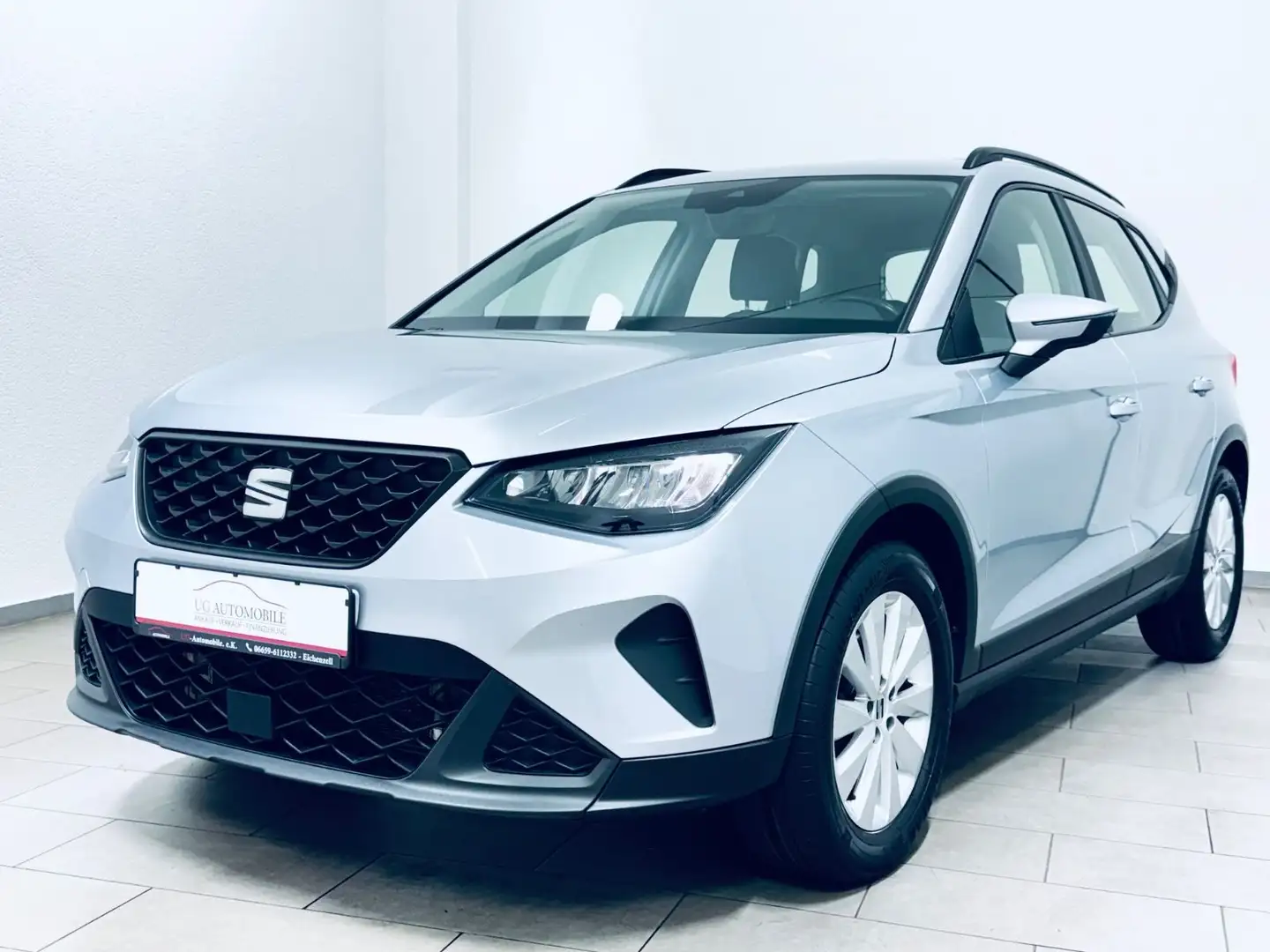 SEAT Arona Style 1.0 TSI * 1.HAND * NAVI * TEMPOMAT * Silber - 1