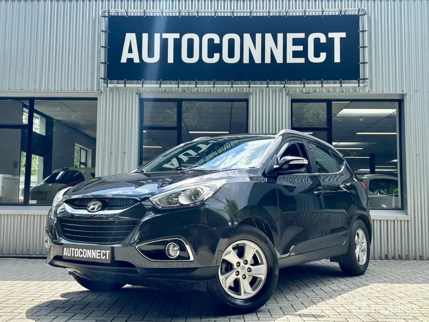Hyundai iX35 2.0i. AUTOMAAT, CRUISE, CLIMA, STOELVERWARMING. Zwart - 1