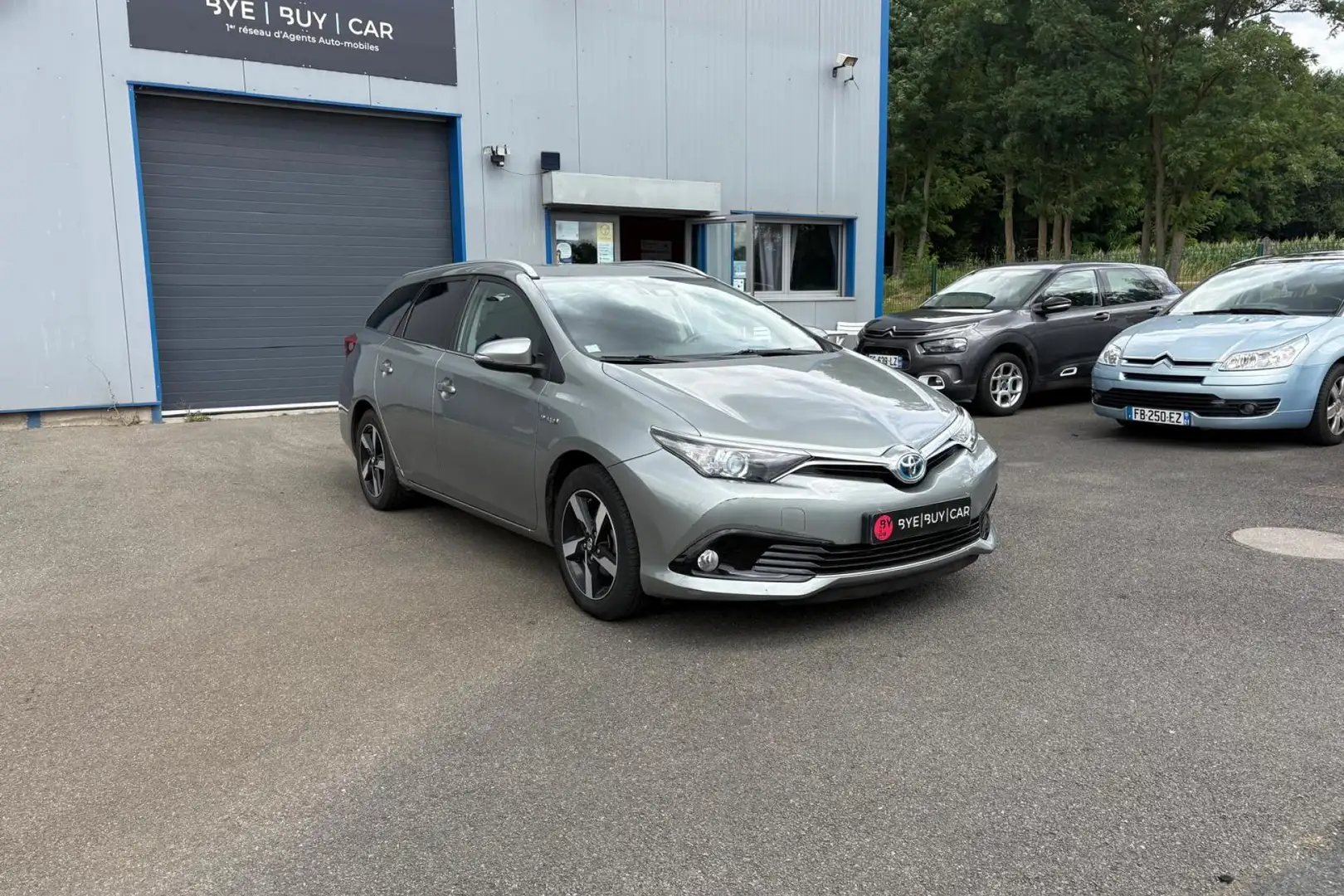 Toyota Auris TOURING SPORT HYBRIDE 1.8L 136CH BVA CVT TREND GTI Gris - 2