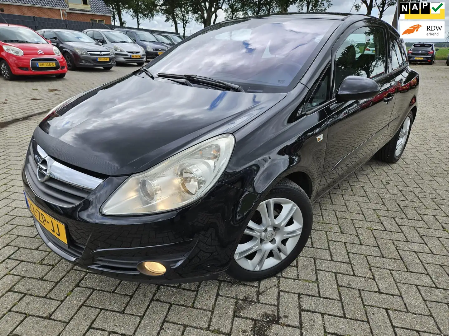 Opel Corsa 1.4-16V Cosmo. 2008. Airco/Cruise/CV/Half Leder/Mi Negro - 1
