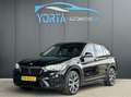 BMW X1 xDrive20i High Executive AUTOMAAT PANO*AFN. HAAK*L Zwart - thumbnail 1