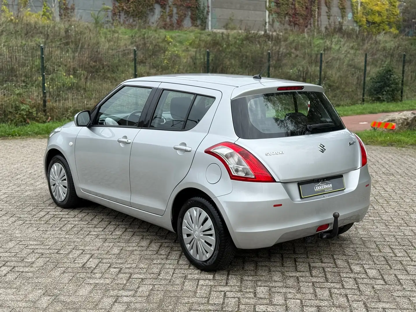 Suzuki Swift 1.2 Style EASSS CRUISE I CAMERA I AIRCO I WEINIG K Gris - 2