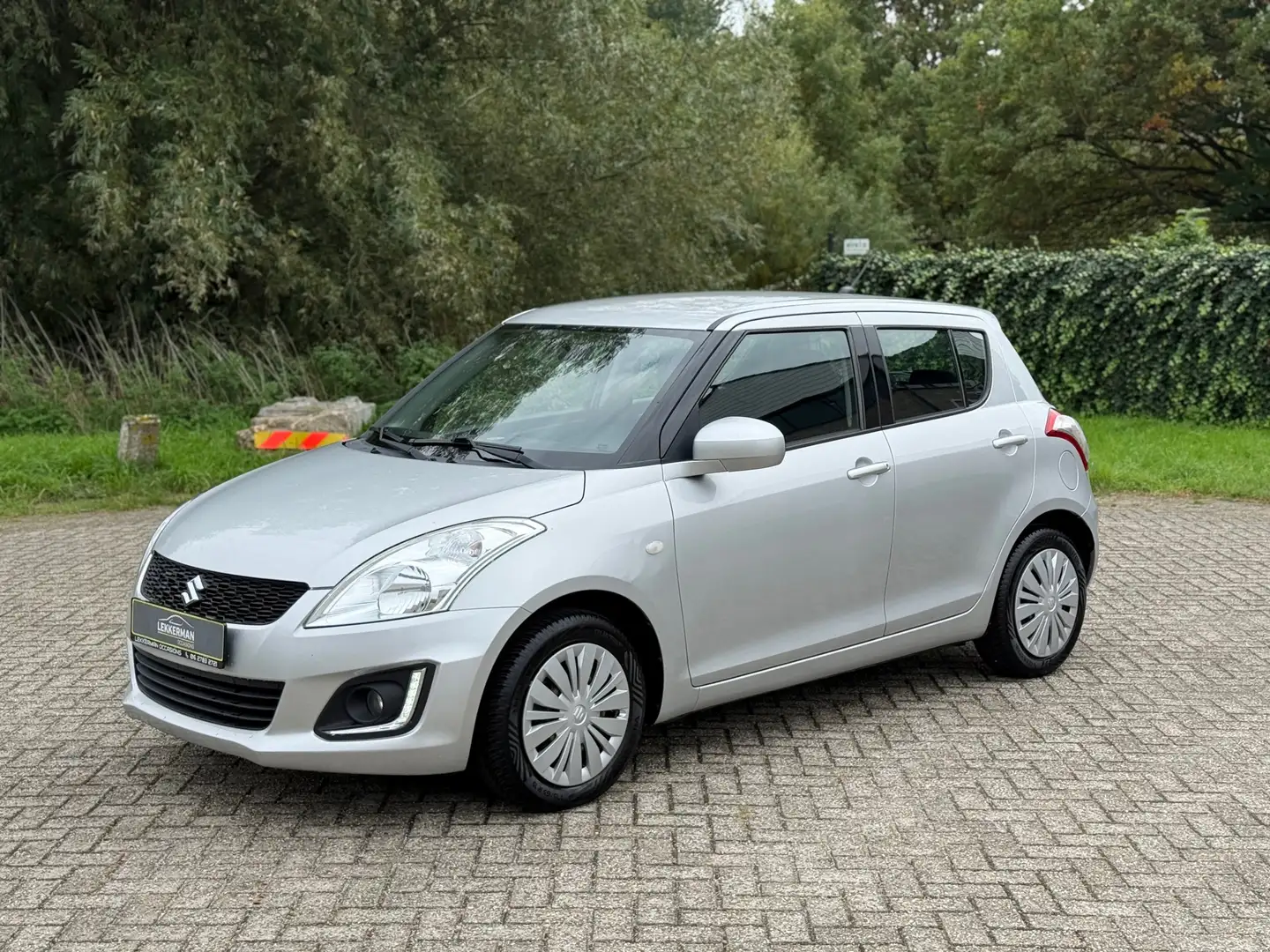 Suzuki Swift 1.2 Style EASSS CRUISE I CAMERA I AIRCO I WEINIG K Gris - 1