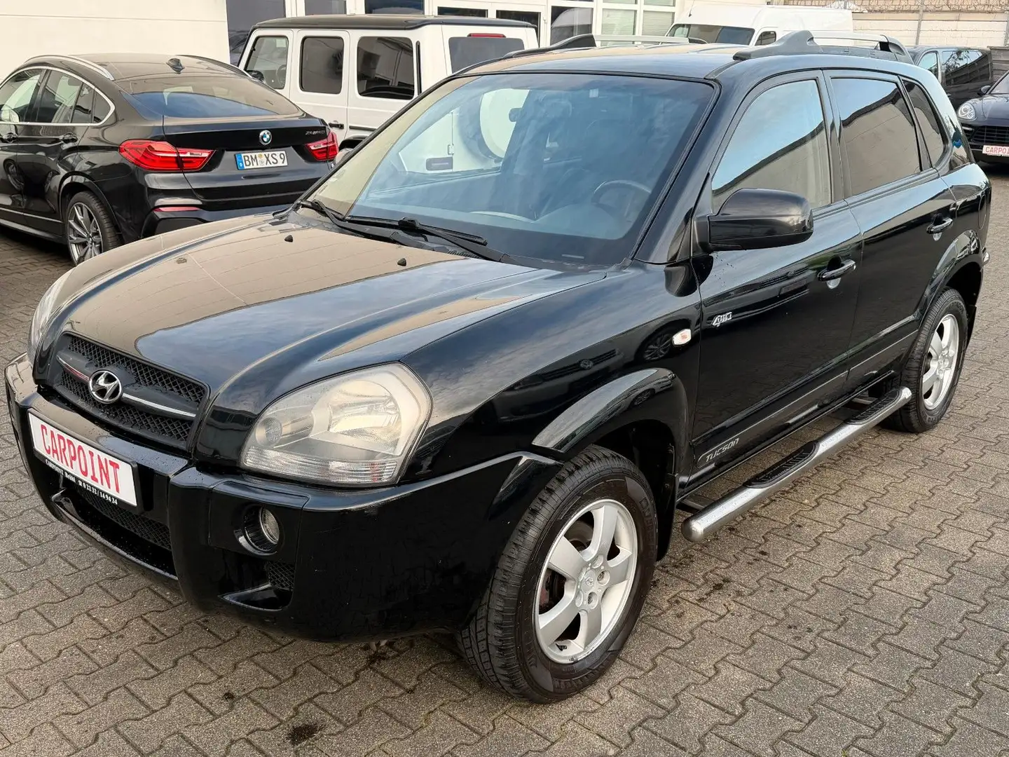 Hyundai TUCSON 2.7-4X4/AUTOMATIK/LPG/AHK/TEMPO/LEDER Schwarz - 1