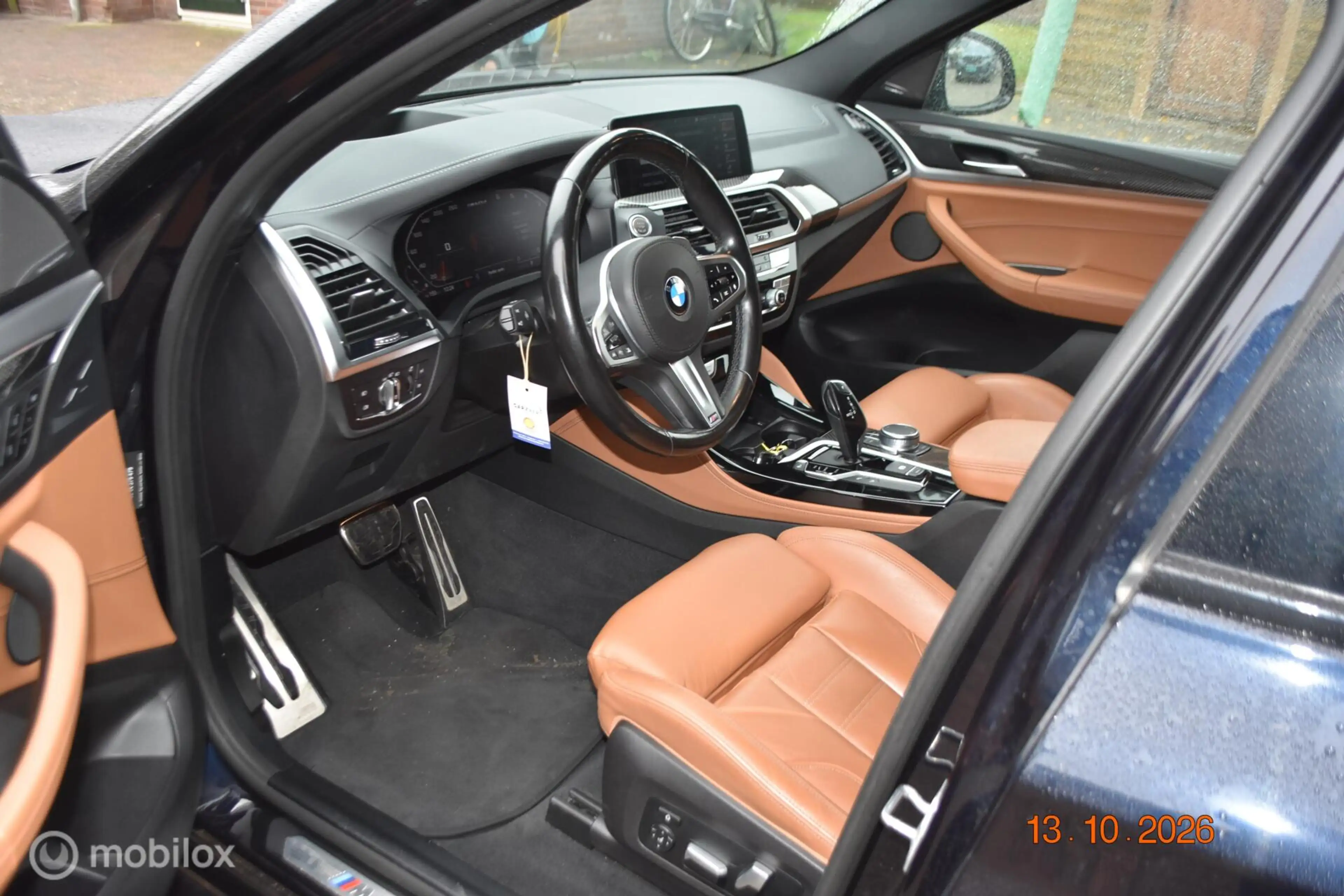 BMW X4 M40d High Executive — photo 12