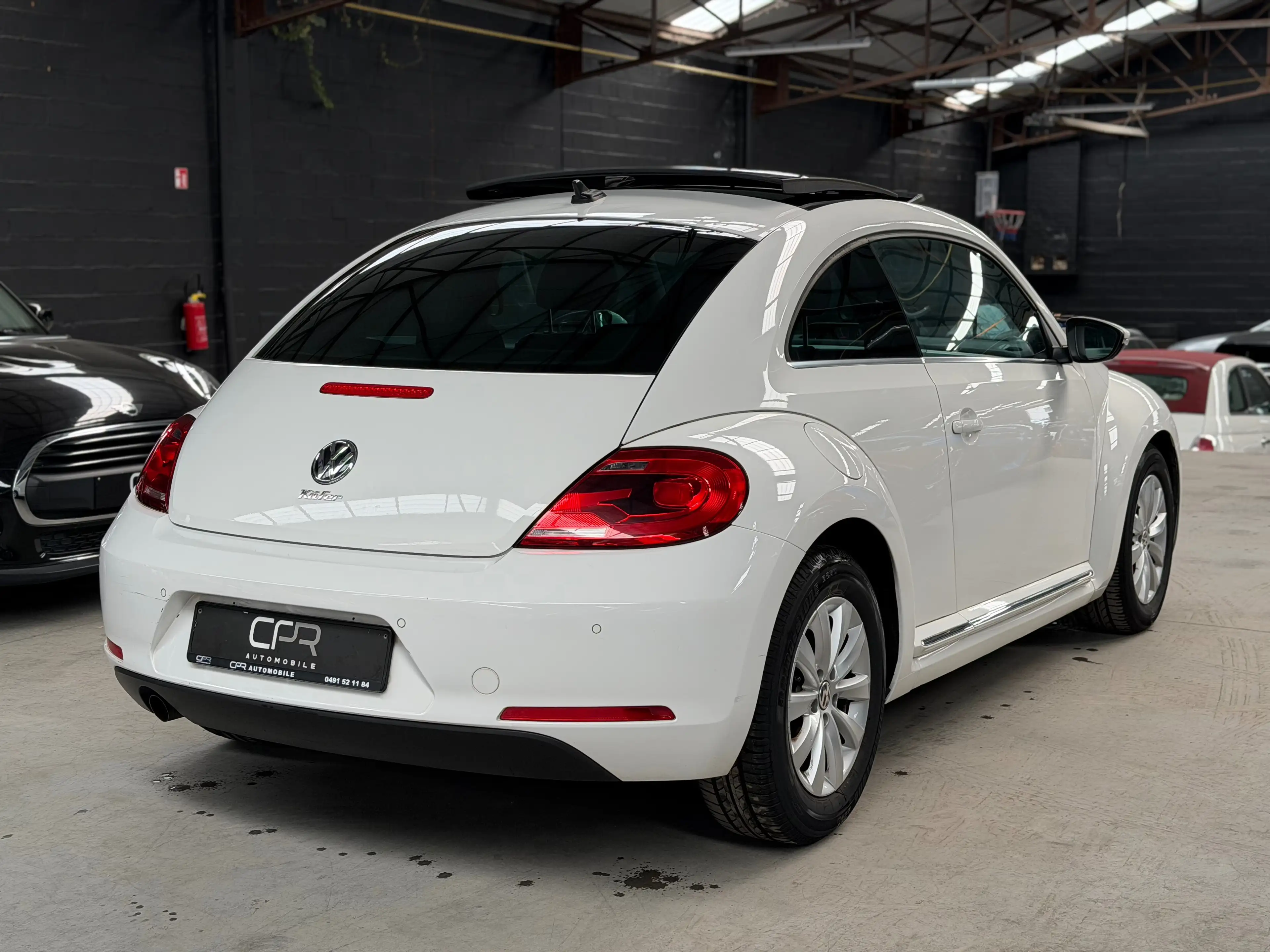 Volkswagen Beetle 1.2 TSI Design BMT * PANO * GPS * XENON * RADAR * CLIM * GARANTIE — photo 4