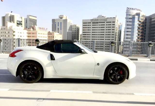 nissan 370z roadster-3-7-v6-330cv-servicebook-nissan-garanzia wit