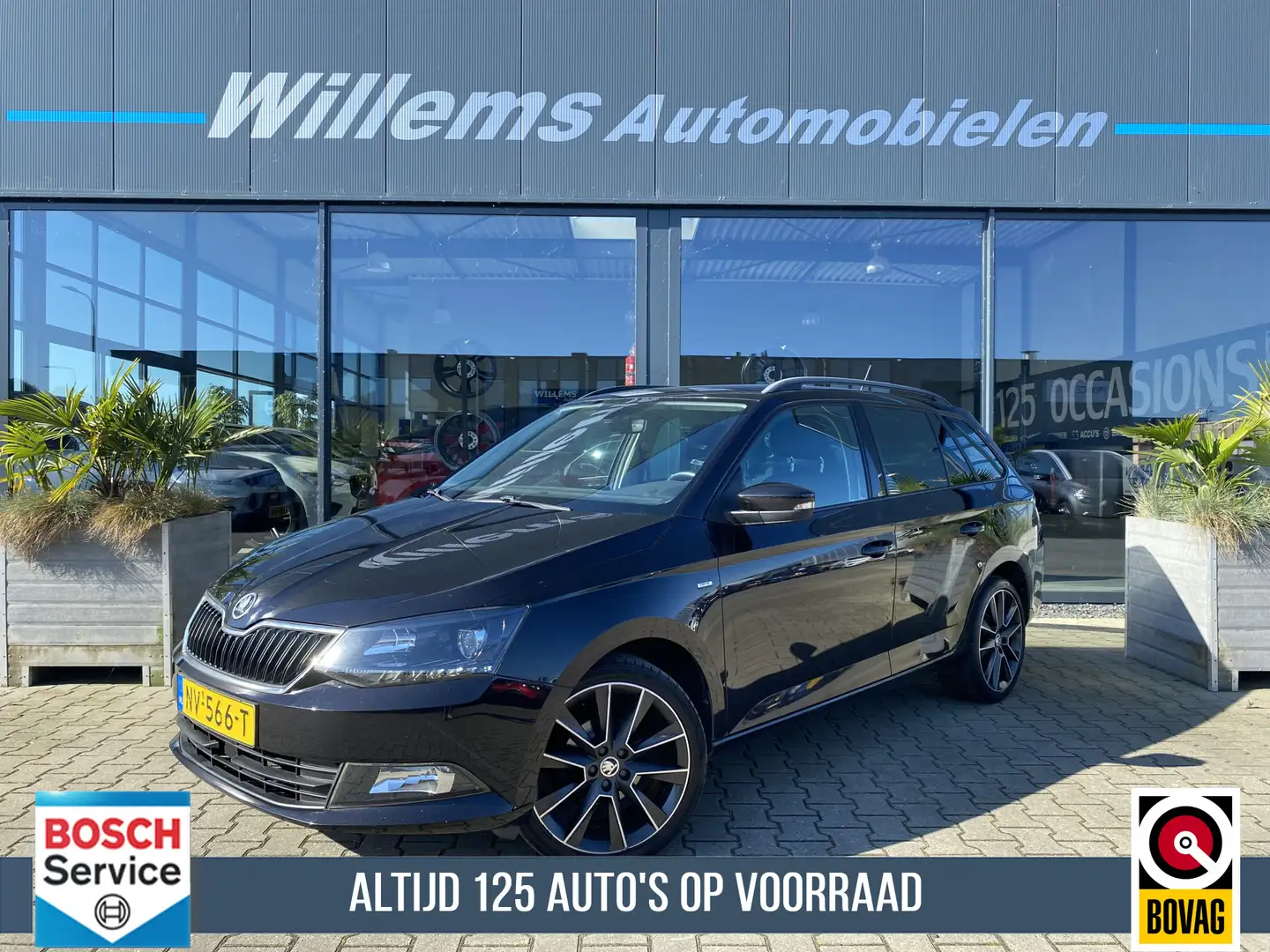 Skoda Fabia Combi 1.2 TSI Drive Trekhaak, Navigatie & Cruise C Noir - 1