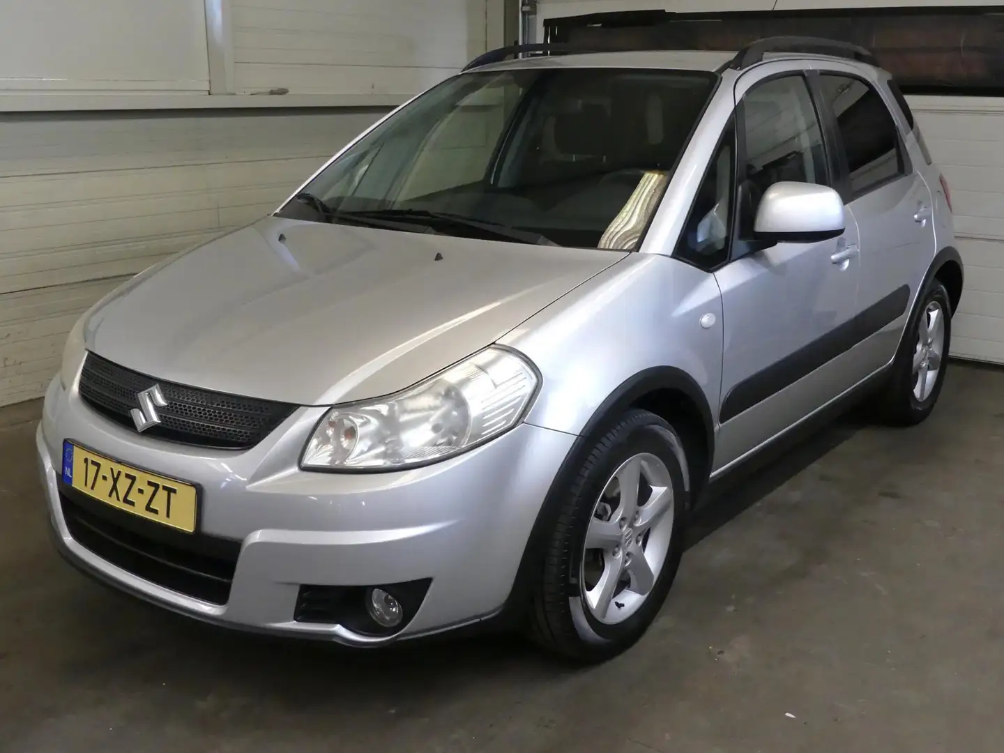 Suzuki SX4 1.6 Shogun - Airco - Weinig KM NAP! - Trekhaak Grigio - 1