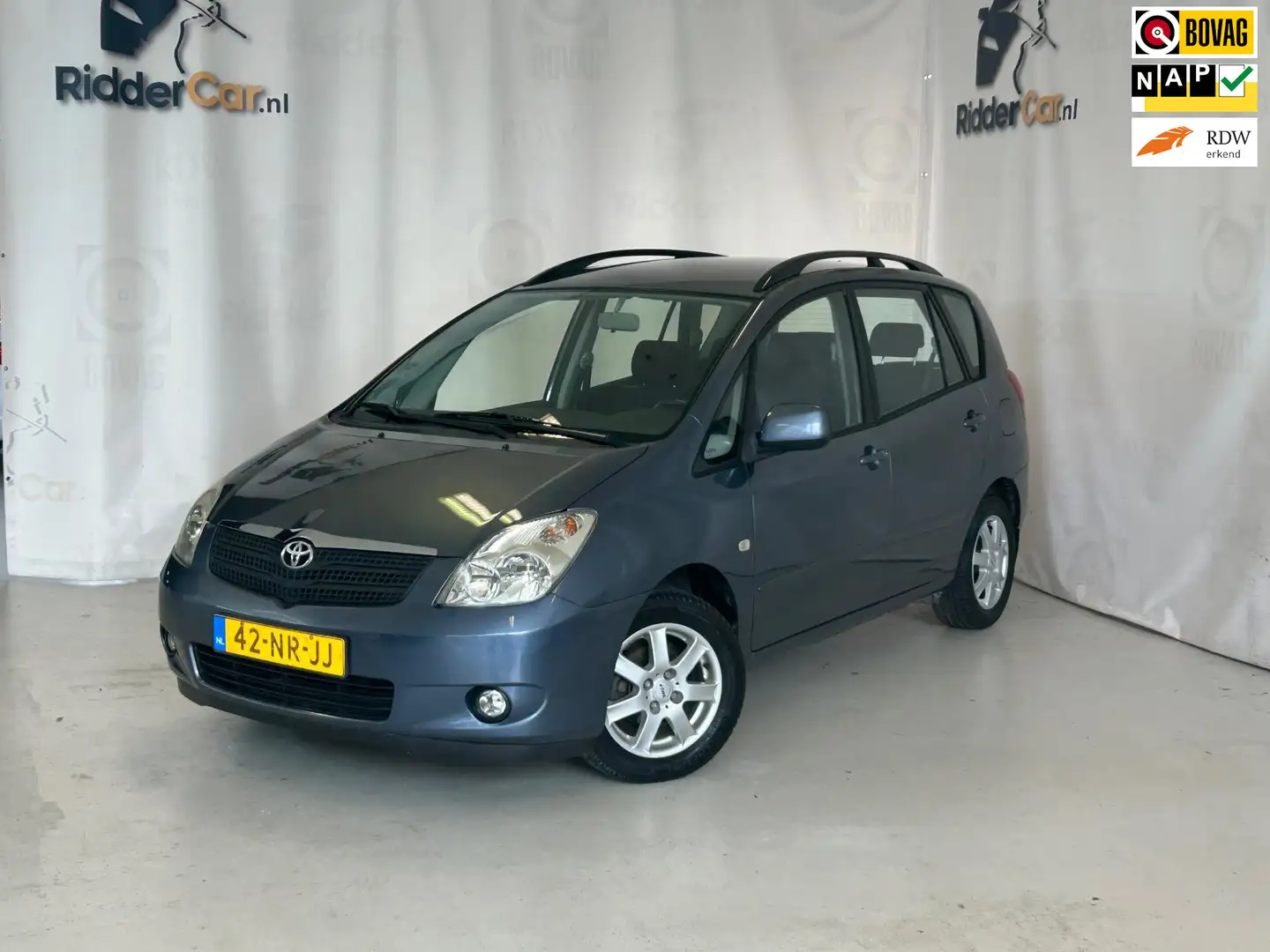 Toyota Corolla Verso 1.6 VVT-i Linea Sol|2E EIG|NAP|AIRCO|TREKHAAK|ELEK Blauw - 1