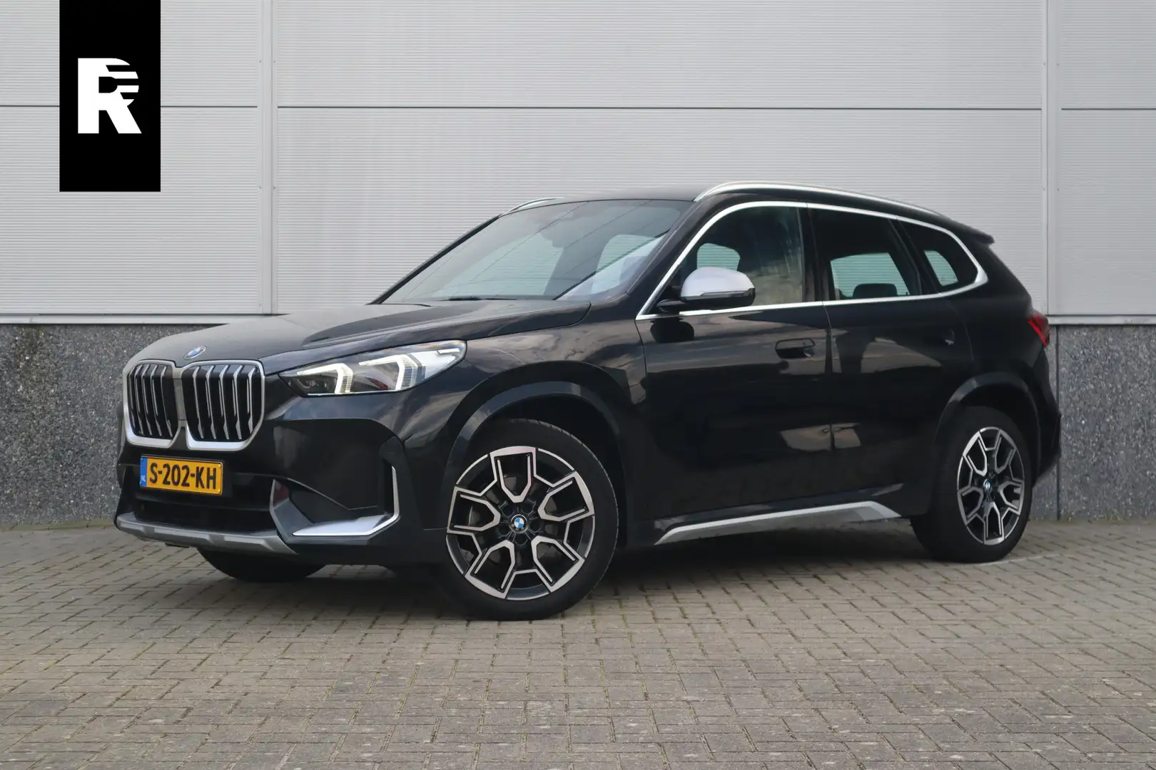 BMW X1 sDrive18i X-Line / Trekhaak / Adaptieve Cruise / 1 Noir - 1