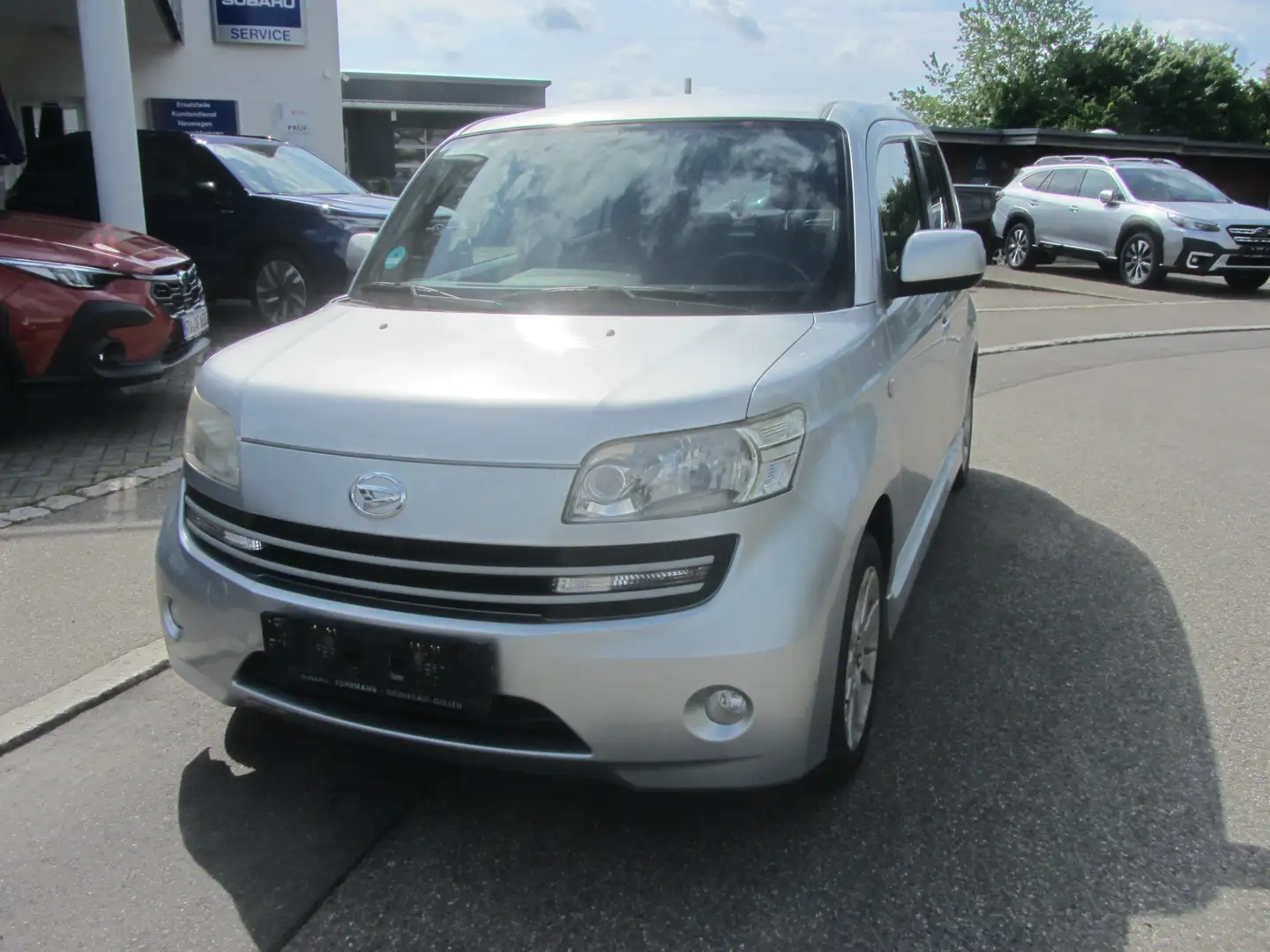 Daihatsu Materia 1.3 Plateado - 1