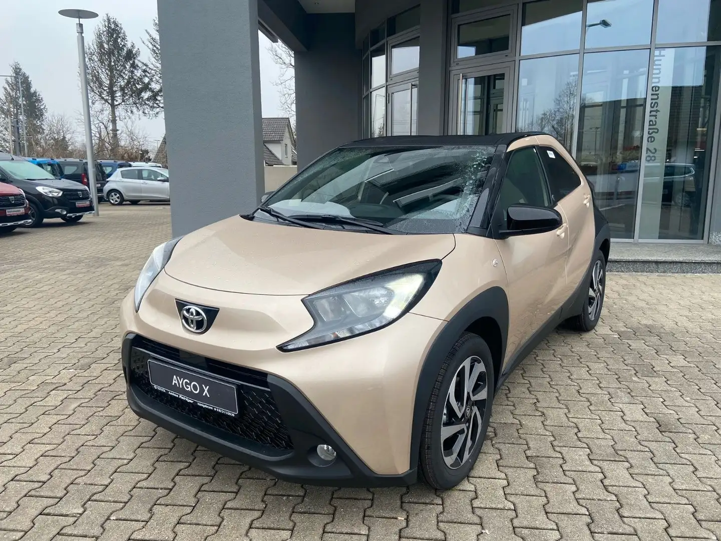 Toyota Aygo X 1.0-l-VVT-i Team D S-CVT*RFK,SHZ,ACC Bej - 1