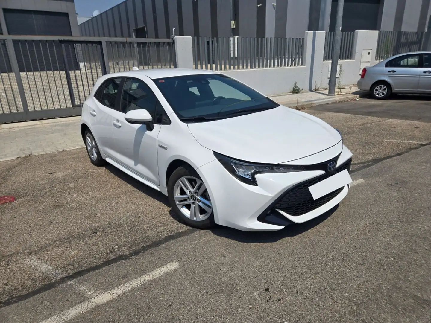Toyota Corolla 125H Business Plus Blanco - 1