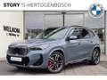 BMW iX1 eDrive20 M Sport 67 kWh / Panoramadak / Trekhaak / Grijs - thumbnail 1