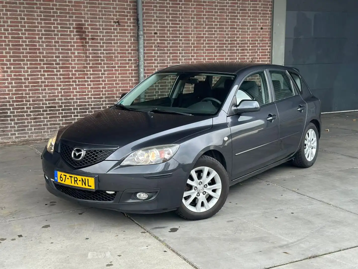 Mazda 3 2.0 S-VT Kintaro Sport AANBIEDING! (CRUISE, PARKEE Grijs - 1