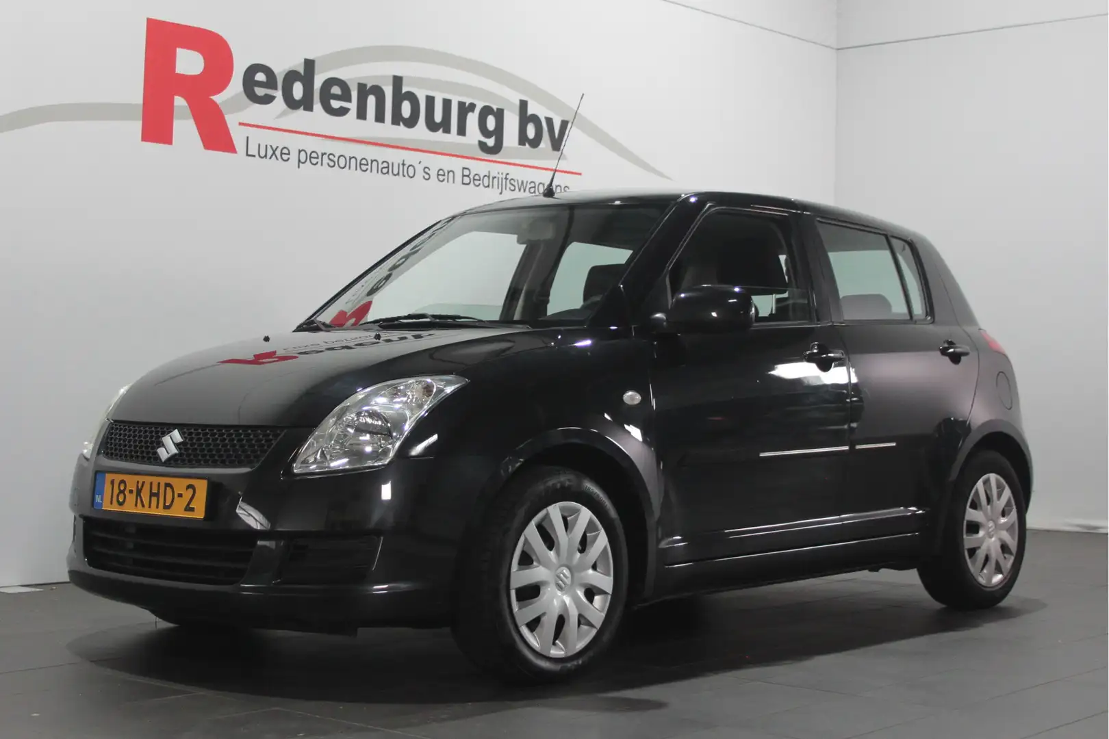 Suzuki Swift 1.3 Comfort - 5 drs. - Airco / Radio cd Negro - 1