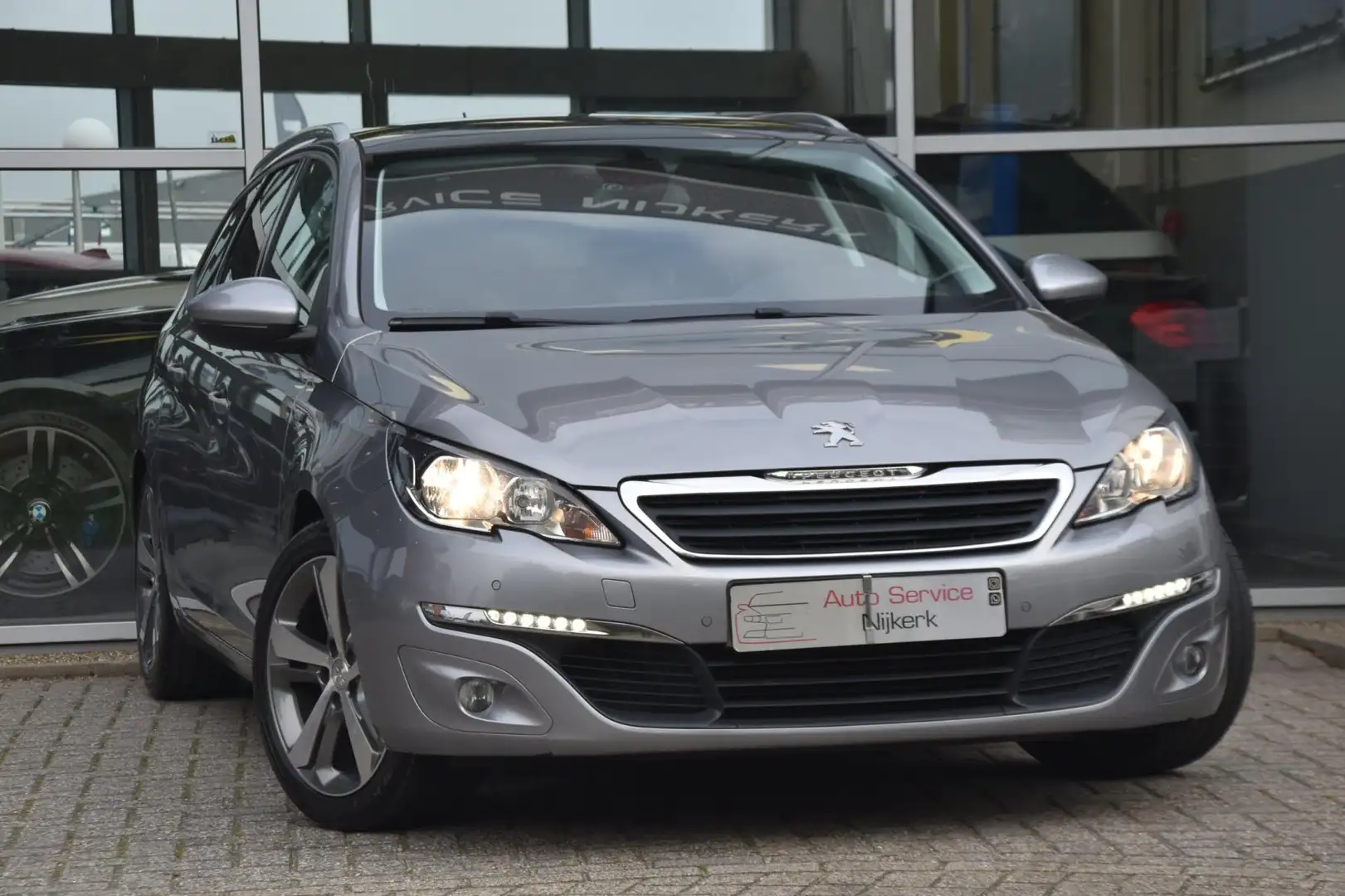 Peugeot 308 SW 1.2 PureTech Style Pano. dak Led 1ste Eigenaar Gris - 1