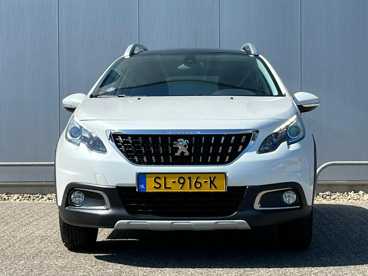 Peugeot 2008 110pk Allure | Panoramadak | Navigatie | Trekhaak Wit - 2