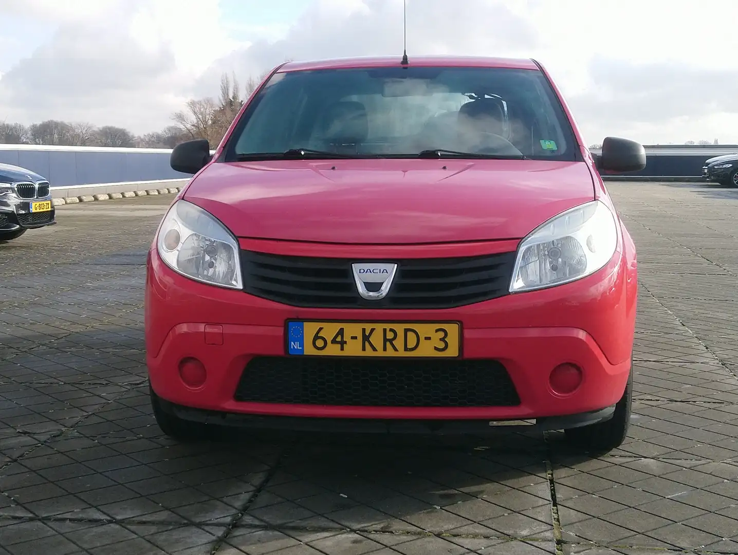 Dacia Sandero €2899,- 1.2 Ambiance Apk 2025 Nap pas Nwe Distr Rouge - 1