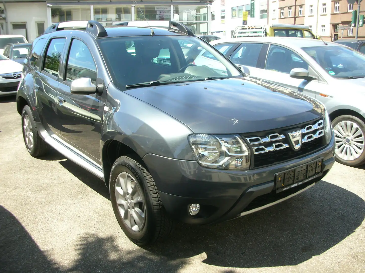 Dacia Duster Prestige 1.2 Klima *Navi *Leder *SHZ Grijs - 1