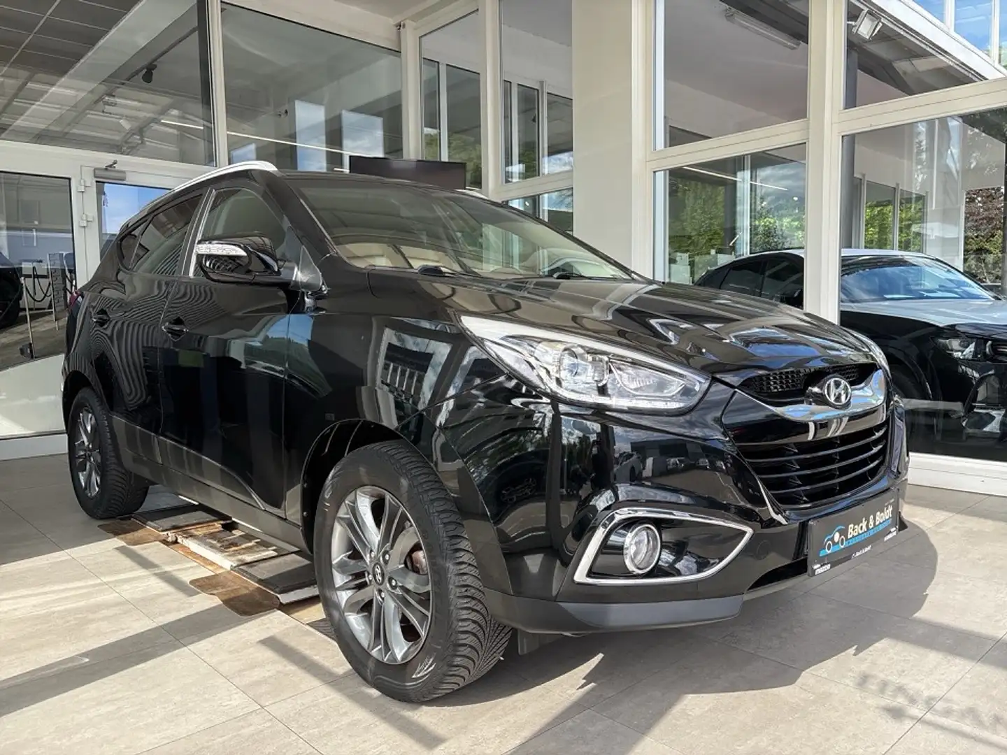 Hyundai TUCSON blue Style 1.6i*NAVI,RFK,SITZHEIZUNG,EPH* - 2