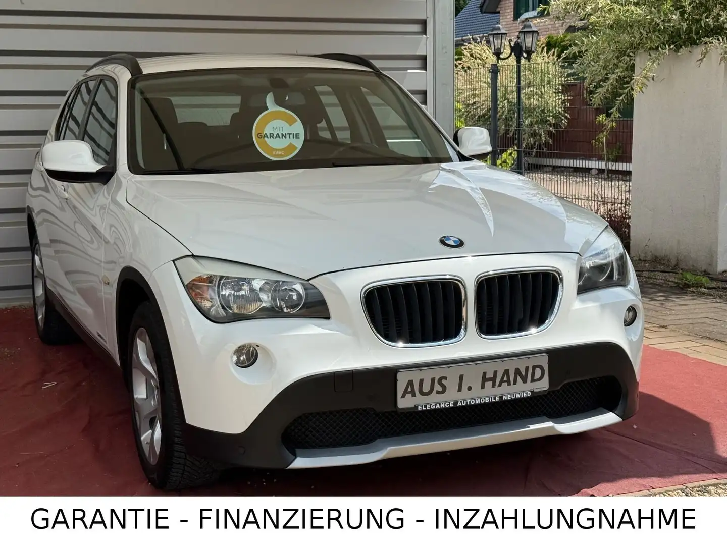 BMW X1 18 d sDrive/Garantie/Scheckheft/1.Hand/Ahk. Weiß - 1