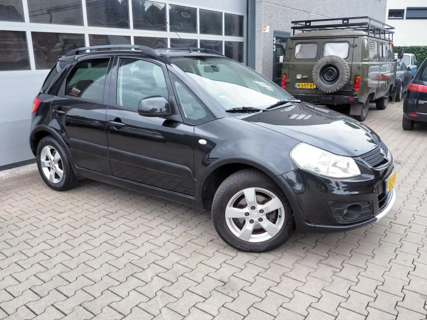 Suzuki SX4 1.6 Exclusive CLIMA STOELVERW. TREKHAAK LM VELGEN Noir - 1
