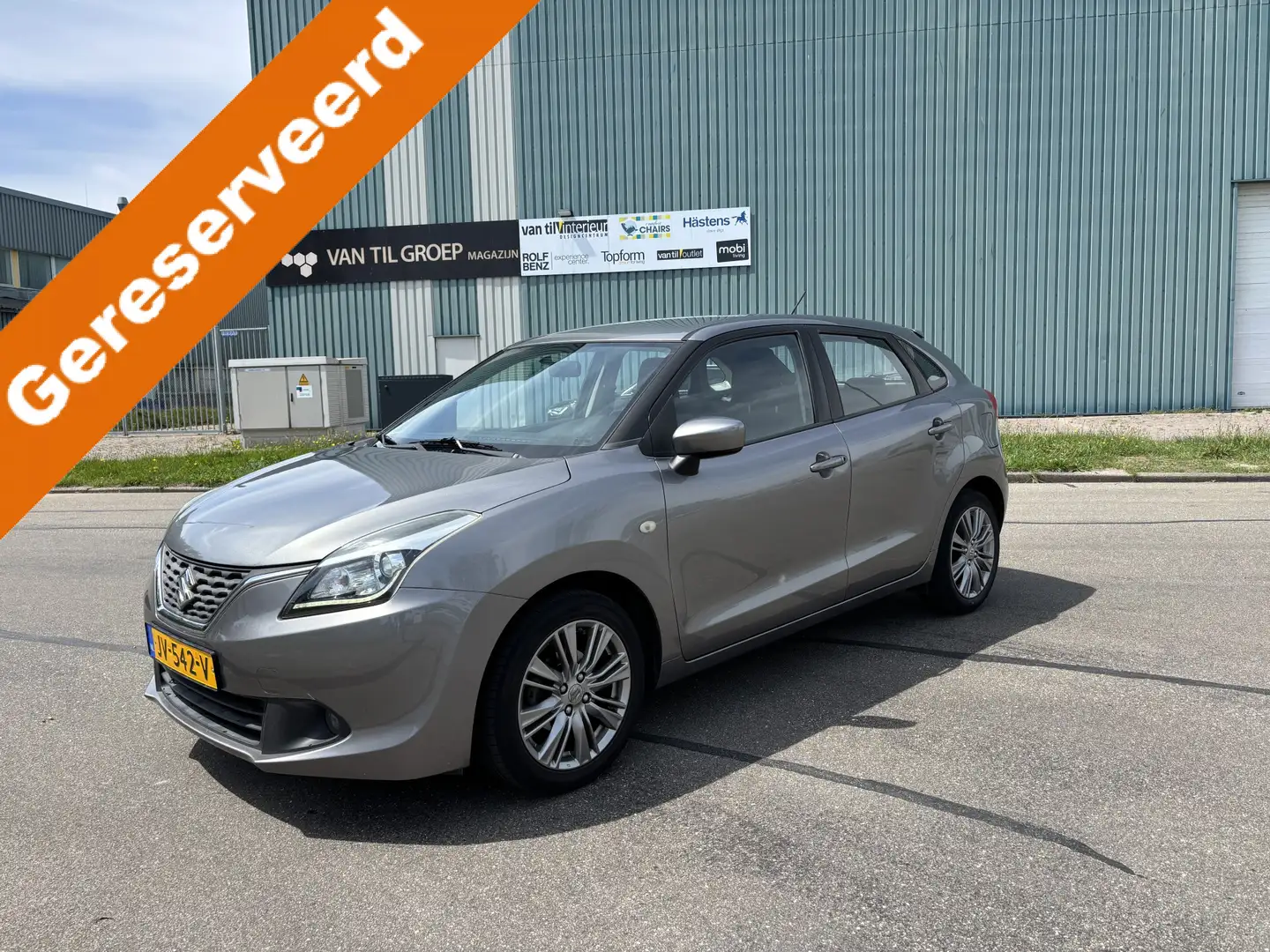 Suzuki Baleno 1.2i Exclusive 90 PK. Zuinige en zeer betrouwbare Gri - 1