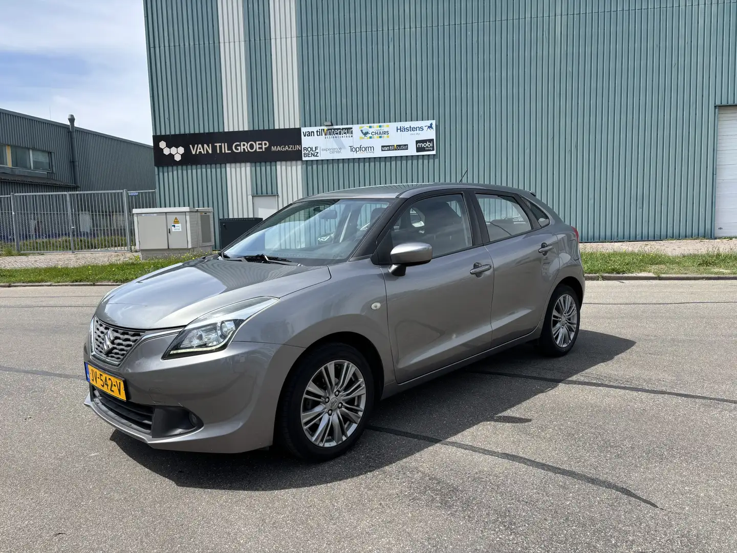 Suzuki Baleno 1.2i Exclusive 90 PK. Zuinige en zeer betrouwbare Grijs - 1
