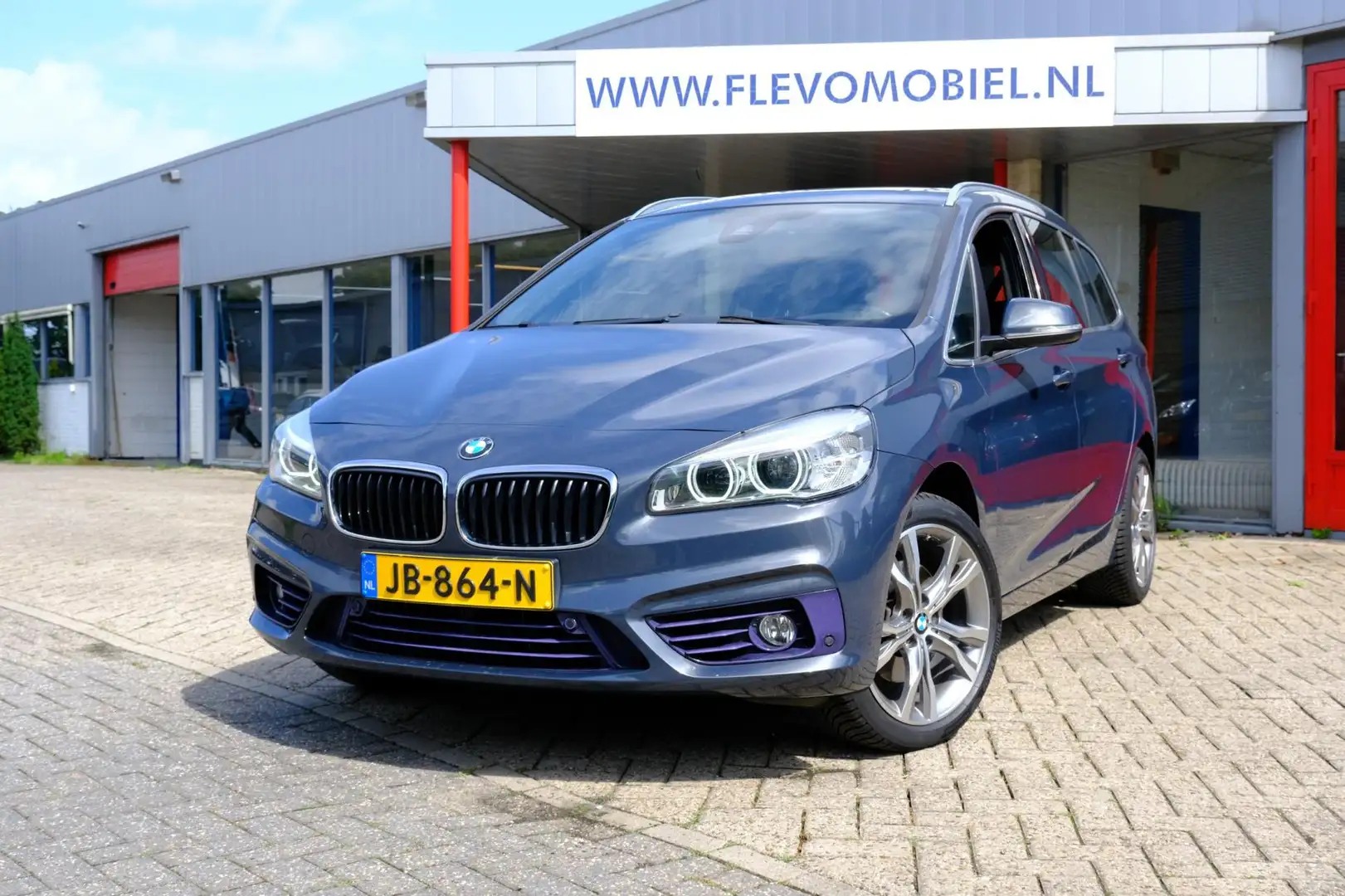 BMW 218 2-serie Gran Tourer 218i Sport 7-pers. Pano|Leder| Grijs - 1