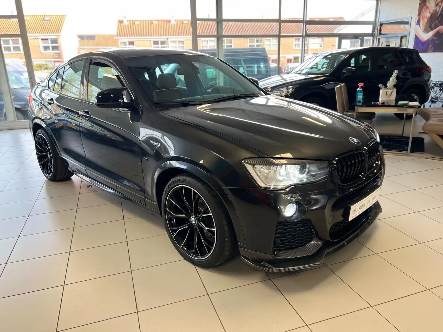 BMW X4 M4.0i High Executive "34534km" Zwart - 1