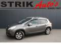 Peugeot 2008 1.2 PureTech Style - RIJKLAAR - NAVIGATIE - CLIMAT Grijs - thumbnail 1