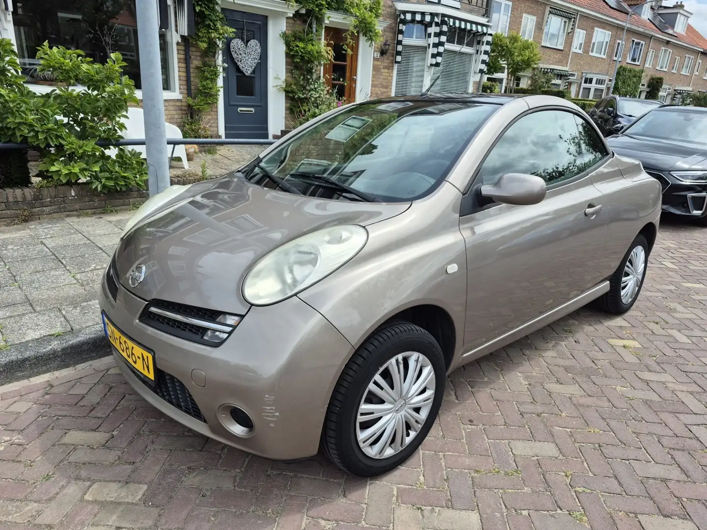Nissan Micra 1.4 Tekna Brons - 1