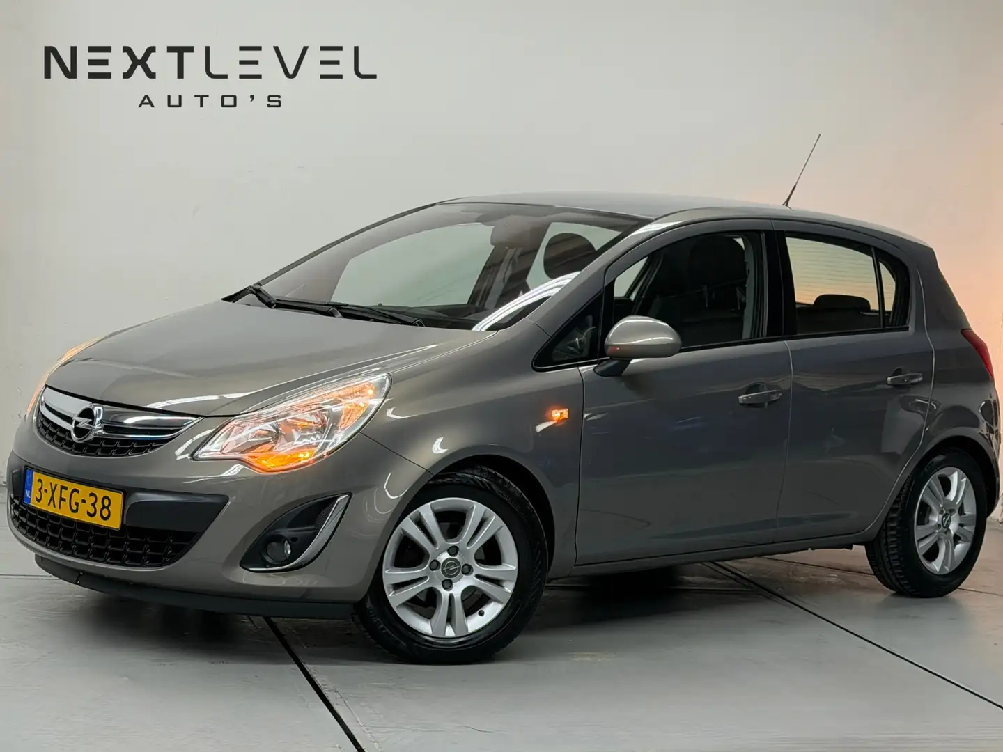 Opel Corsa 1.2-16V Edition Automaat Cruise Lage KM Braun - 1